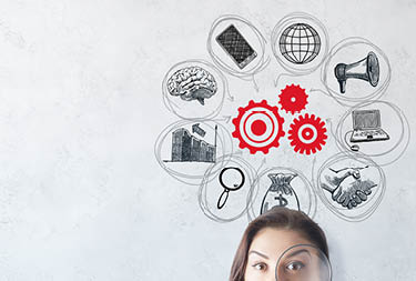 Portrait of surprised young european woman with magnifier on concrete background with business sketch  Startup and teamwork concept